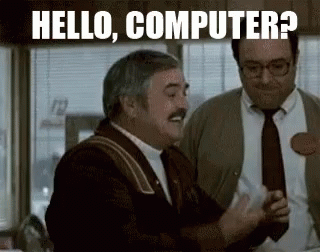 Engineer Scotty trying to speak with the computer using the mouse as microphone